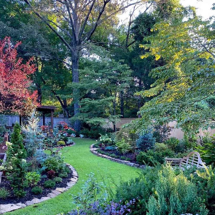 Beautifully layered landscape garden filled with a variety of perennial plants