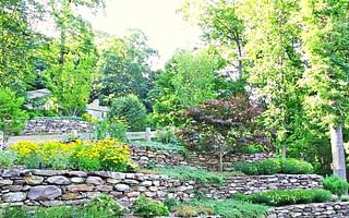 What are some tips for creating a beautiful slope garden with perennials?